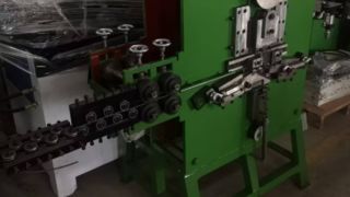 Máquina antiga de gancho automático